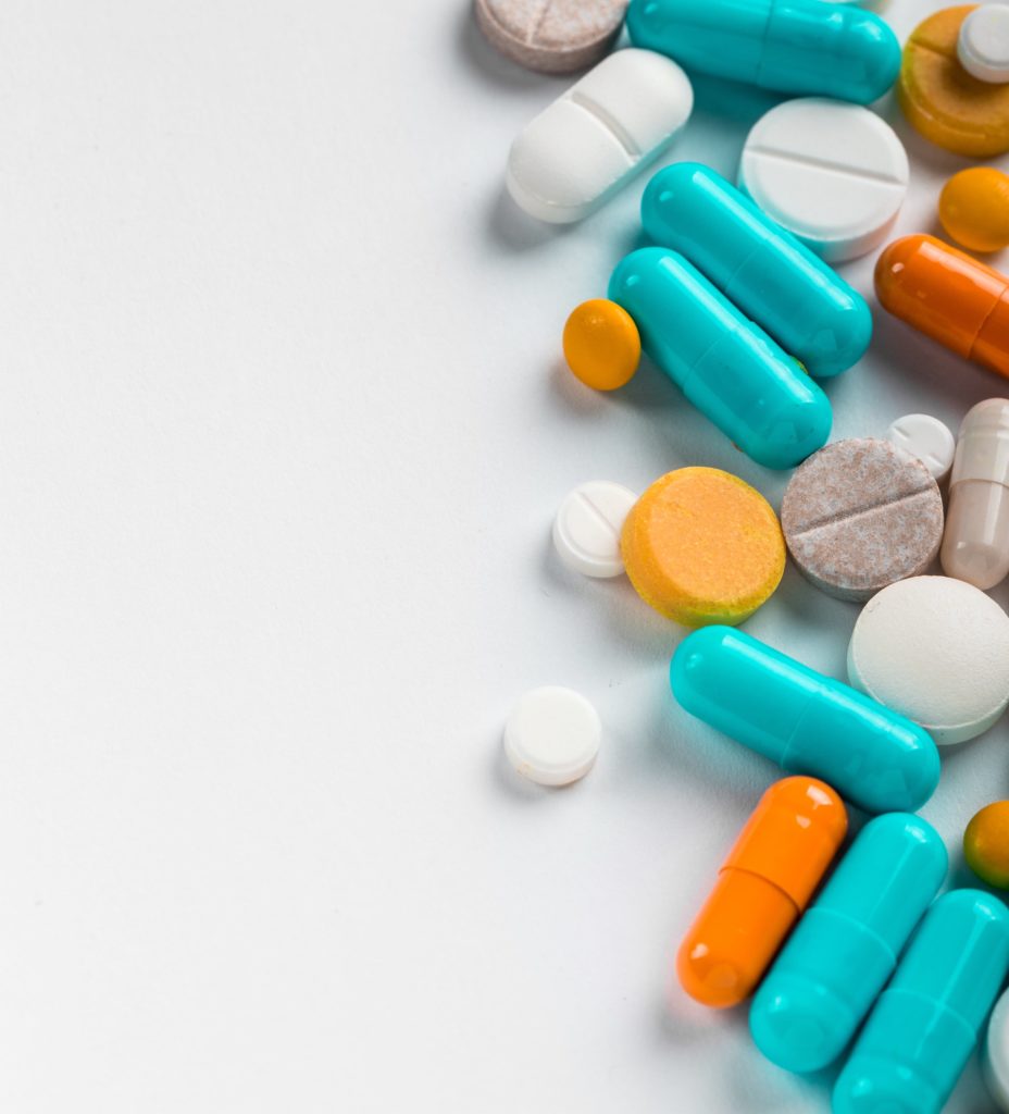 array of prescription drug tablets and pills 